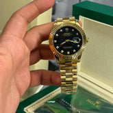 Rolex Datejust Χρυσό με μαύρη Πλάκα